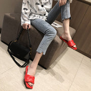 Flat woven mules