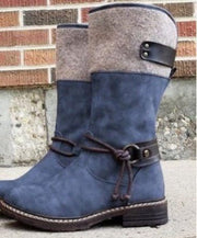 Stylish blue suede and felt winter boots with buckle and lace details, ideal for cold weather.