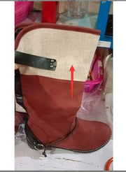 Brown suede snow boot with a textile upper and decorative strap, showcasing a warm and stylish winter footwear option.